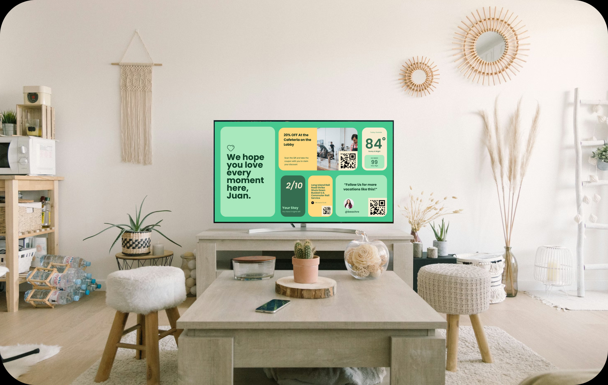 A StayBoard welcome screen running on the television of a rented apartment